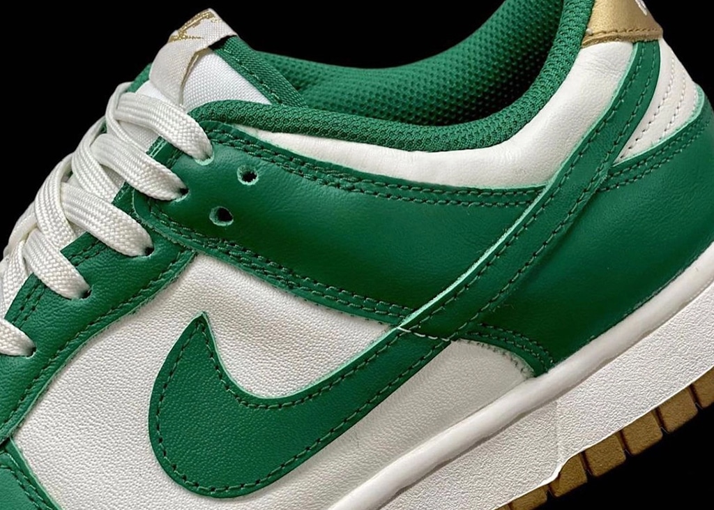 De Nike Dunk Low duikt op in een groen met gouden colorway